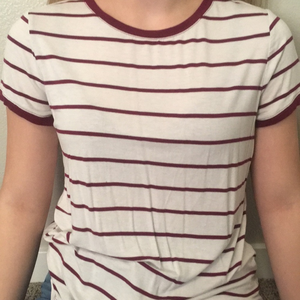 Horizontal red as white striped shirt.